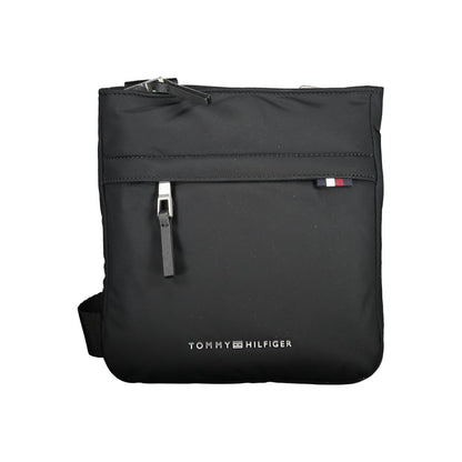 Shoulder Bag by Tommy Hilfiger for men in polyester black features an effortlessly chic silhouette with a secure zipper, ample external-pockets & internal-pockets, and versatile shoulder-strap & adjustable-strap for effortlessly chic everyday luxury.