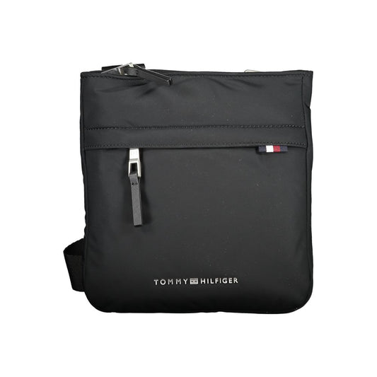 Shoulder Bag by Tommy Hilfiger for men in polyester black features an effortlessly chic silhouette with a secure zipper, ample external-pockets & internal-pockets, and versatile shoulder-strap & adjustable-strap for effortlessly chic everyday luxury.