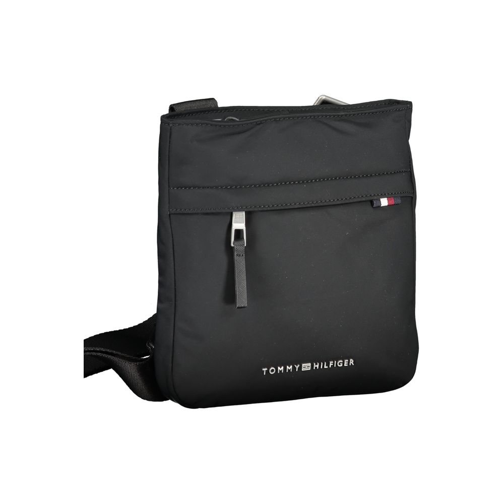 Shoulder Bag by Tommy Hilfiger for men in polyester black features a effortless chic silhouette with a secure zipper, ample external-pockets & internal-pockets, and versatile shoulder-strap & adjustable-strap for a effortless chic finish.