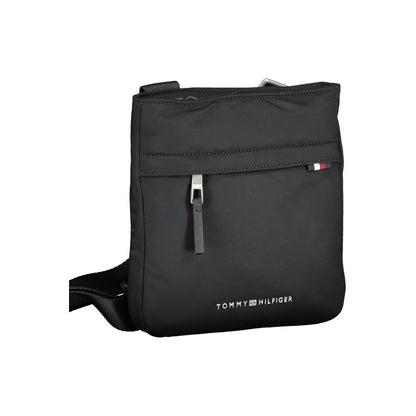 Shoulder Bag by Tommy Hilfiger for men in polyester black features a effortless chic silhouette with a secure zipper, ample external-pockets & internal-pockets, and versatile shoulder-strap & adjustable-strap for a effortless chic finish.