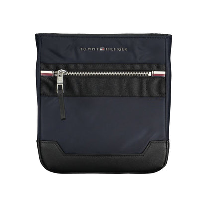 Shoulder Bag by Tommy Hilfiger for men in polyester & polyethylene blue presents a statuesque silhouette, showcasing a secure zipper and statuesque external-pockets & internal-pockets with versatile shoulder-strap & adjustable-strap for a sophisticated look.