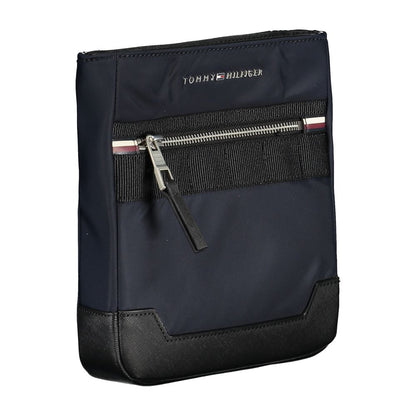 Shoulder Bag by Tommy Hilfiger for men in polyester & polyethylene blue features a stately silhouette, showcasing a secure zipper, ample external-pockets & internal-pockets, and stately shoulder-strap & adjustable-strap for a stately finish.
