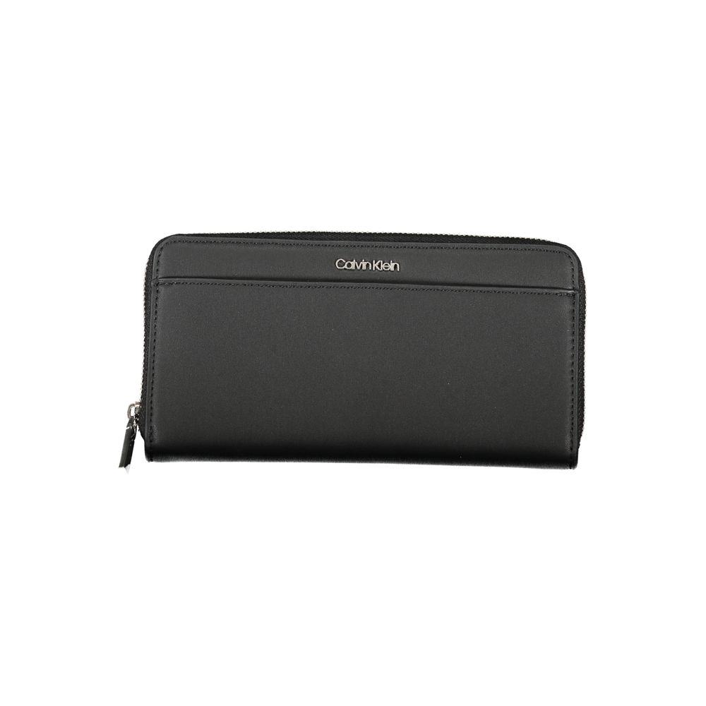 Cardholder Wallet by Calvin Klein for women in polyester & polyethylene black presents a architectural silhouette from the Polyester & Polyethylene Cardholder Wallet collection, showcasing architectural card-organization rfid-protection coin-purse for a architectural finish.