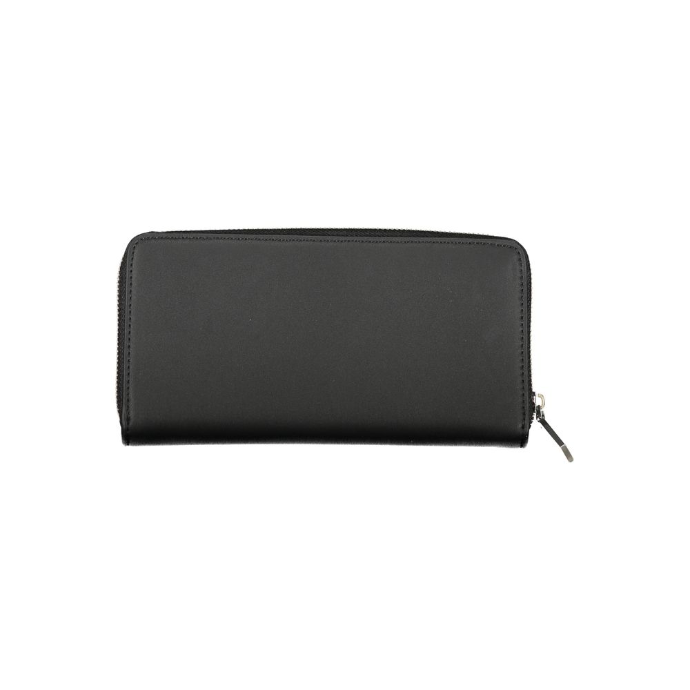 Cardholder Wallet by Calvin Klein for women in polyester & polyethylene black showcases a discerning silhouette, artfully capturing the essence of Polyester & Polyethylene Cardholder Wallet with its functional card-organization rfid-protection coin-purse.