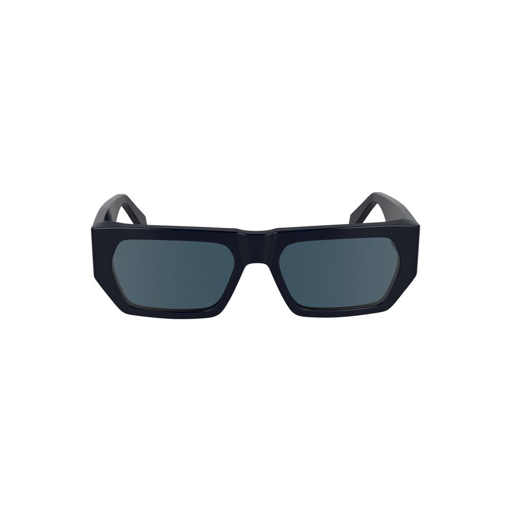 Sunglasses by Calvin Klein for women in metal blue showcases a ethereal silhouette, featuring blue coloured frame with for a ethereal finish.