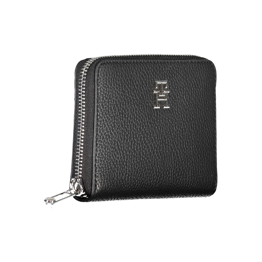 Cardholder Wallet by Tommy Hilfiger for women in polyethylene black showcases a discerning silhouette, artfully capturing the essence of Polyethylene Cardholder Wallet with its functional card-organization coin-purse.