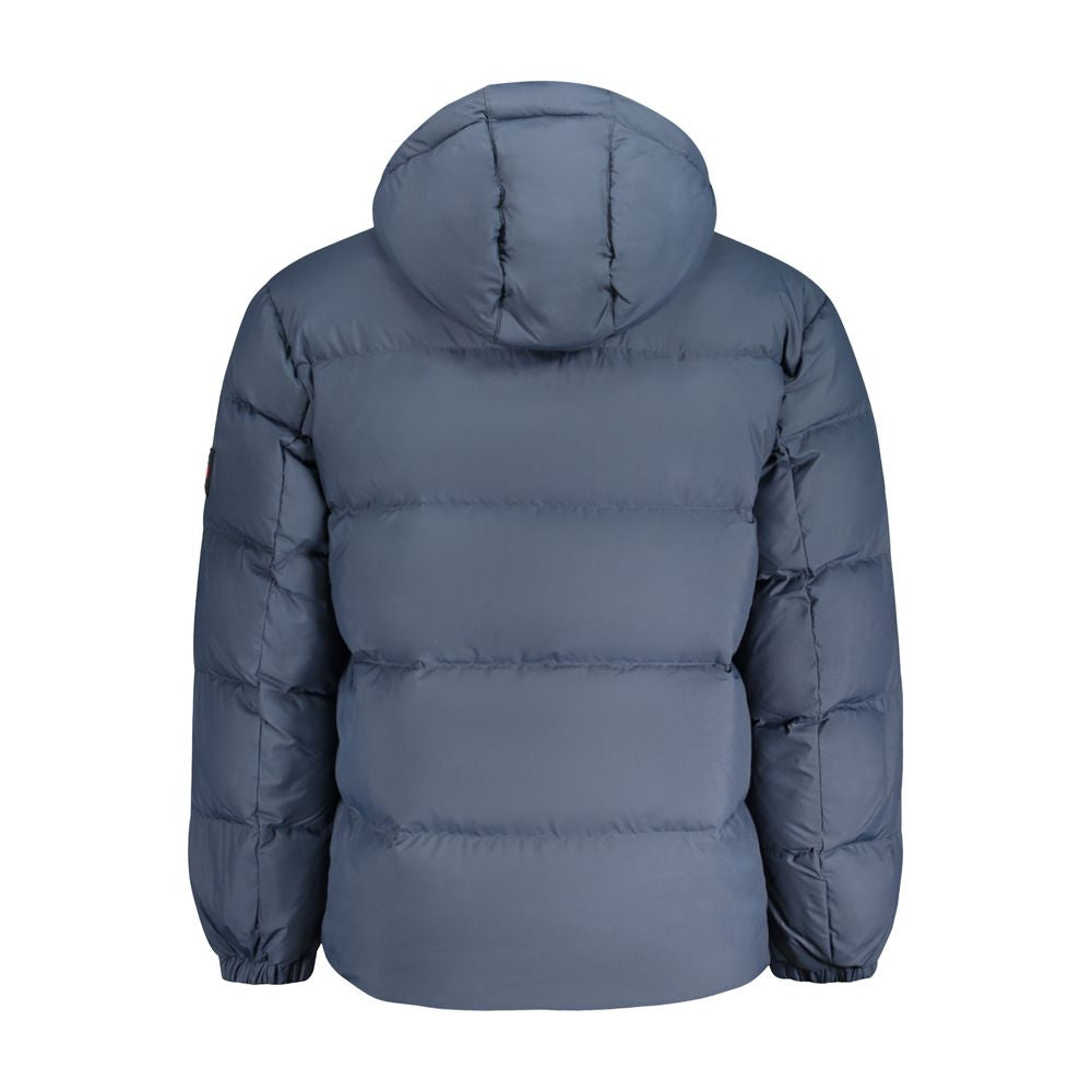 Hooded Jacket by Tommy Hilfiger for men in polyester blue showcases a enveloping silhouette, artfully detailed with a enveloping hooded neckline and premium pockets & hooded for a truly enveloping finish.