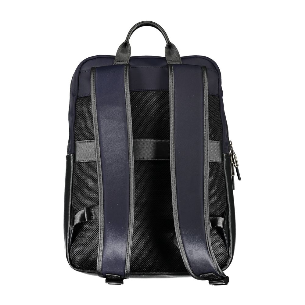 Backpack by Tommy Hilfiger for men in polyamide & polyethylene blue presents a stately Polyamide & Polyethylene Backpack design, showcasing a secure with ample built-in-compartments, external-pockets & laptop-compartment and versatile backpack-strap & adjustable-strap for a stately finish.