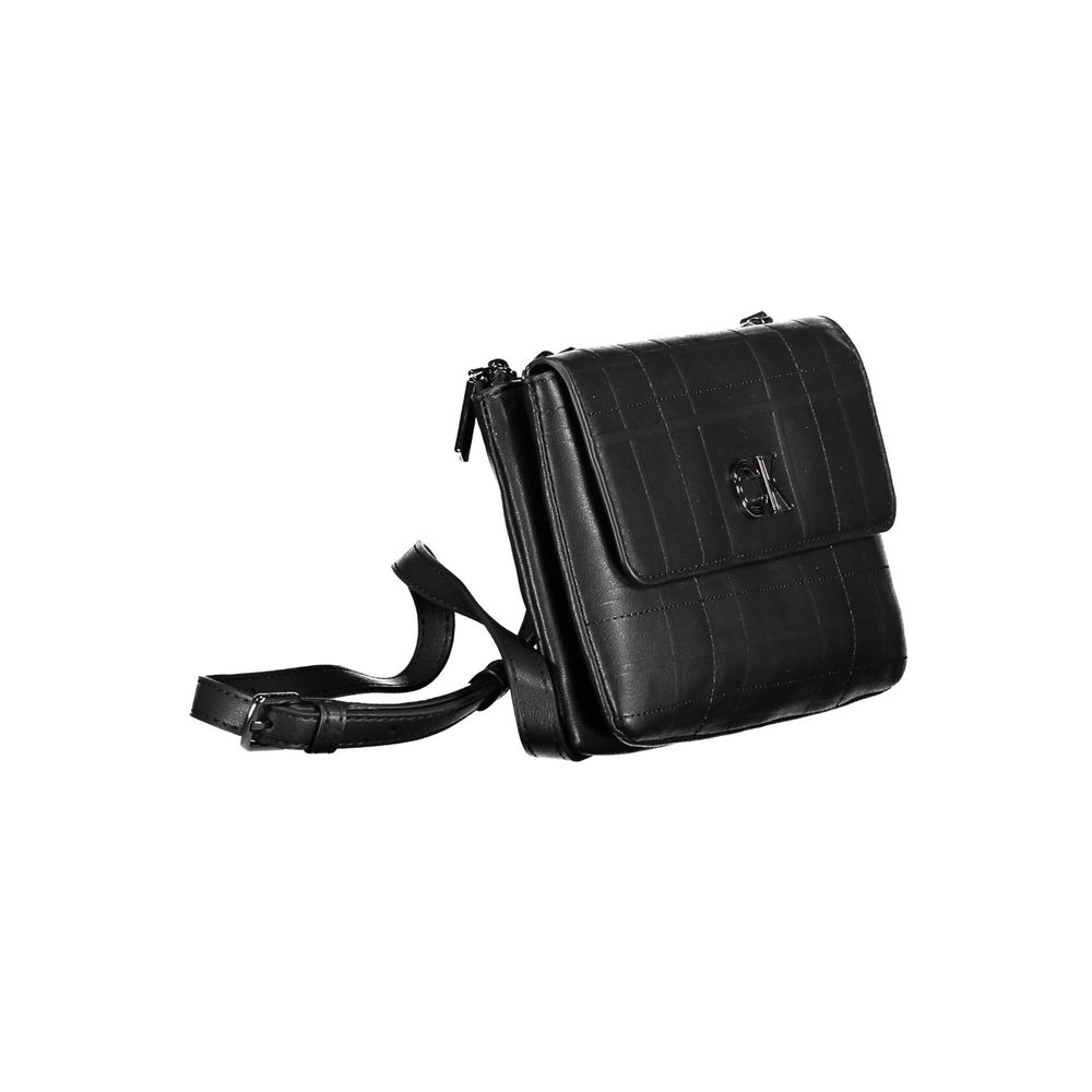 Crossbody Evening Convertible Handbag by Calvin Klein for women in polyester polyethylene faux leather black & signature features an exquisite silhouette, showcasing a secure , ample built-in-compartments & internal-pockets, and exquisite crossbody-strap & adjustable-strap for a sophisticated finish.