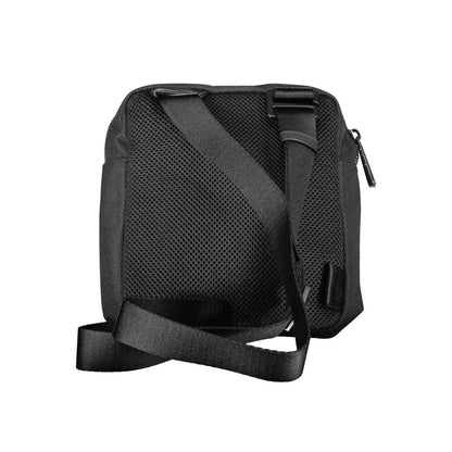 Shoulder Bag by Calvin Klein for men in polyester & polyethylene black features a statuesque silhouette, showcasing a secure zipper and statuesque external-pockets & internal-pockets with versatile shoulder-strap, adjustable-strap & handle for a statuesque finish.