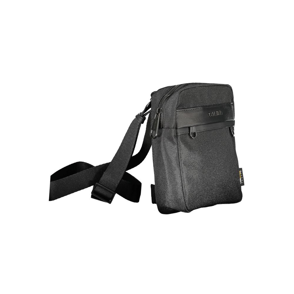 Shoulder Bag by Calvin Klein for men in polyester & polyethylene black features an effortlessly chic silhouette with a secure zipper, ample external-pockets & internal-pockets, and versatile shoulder-strap, adjustable-strap & handle for effortlessly chic everyday luxury.