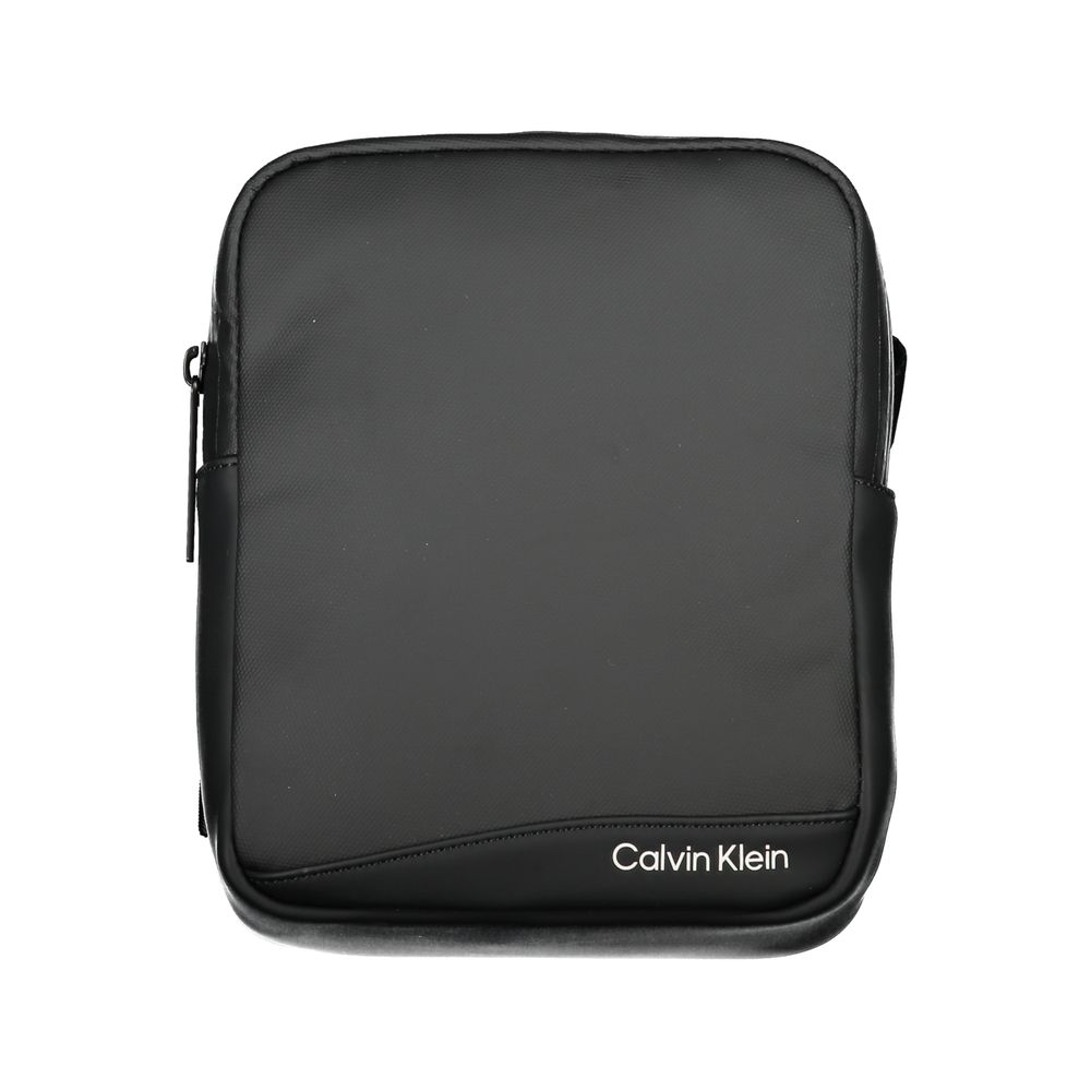Shoulder Bag by Calvin Klein for men in polyester & polyethylene black & signature features a effortless chic silhouette with a secure zipper, ample external-pockets & internal-pockets, and versatile shoulder-strap & adjustable-strap for a effortless chic finish.