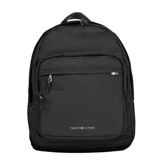 Backpack by Tommy Hilfiger for men in polyester black features a stately Polyester Backpack design, showcasing a secure zipper, ample external-pockets & laptop-compartment, and versatile handle, backpack-strap & adjustable-strap for a stately finish.