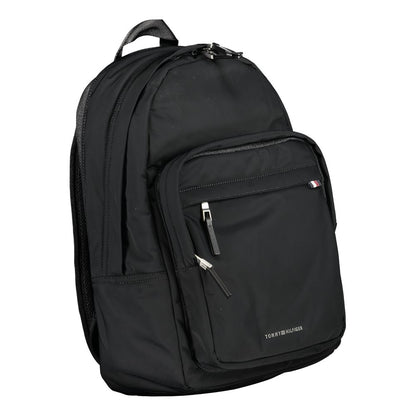 Backpack by Tommy Hilfiger for men in polyester black presents a stately Polyester Backpack design, showcasing a secure zipper with ample external-pockets & laptop-compartment and versatile handle, backpack-strap & adjustable-strap for a stately finish.