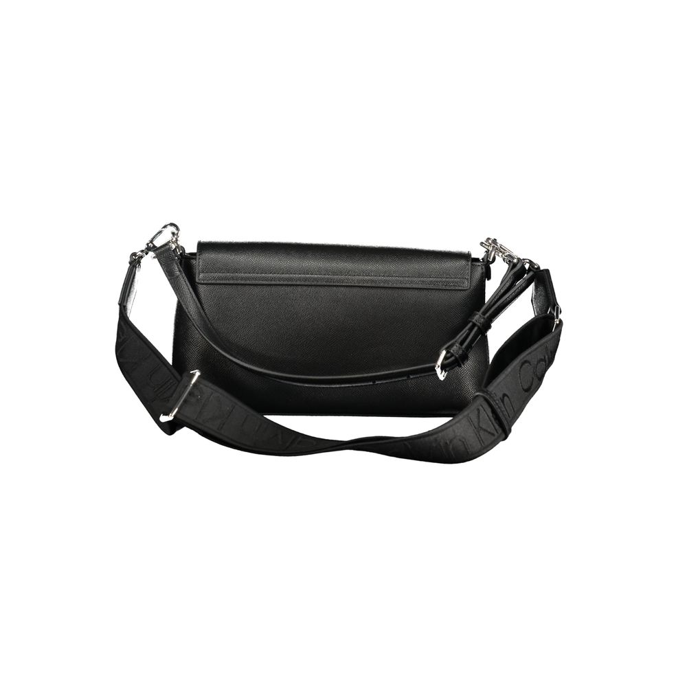 Crossbody Evening Handbag by Calvin Klein for women in polyethylene faux leather black features a exquisite silhouette, showcasing a secure and exquisite internal-pockets & cardholder with versatile crossbody-strap, shoulder-strap, adjustable-strap & handle for a exquisite finish.