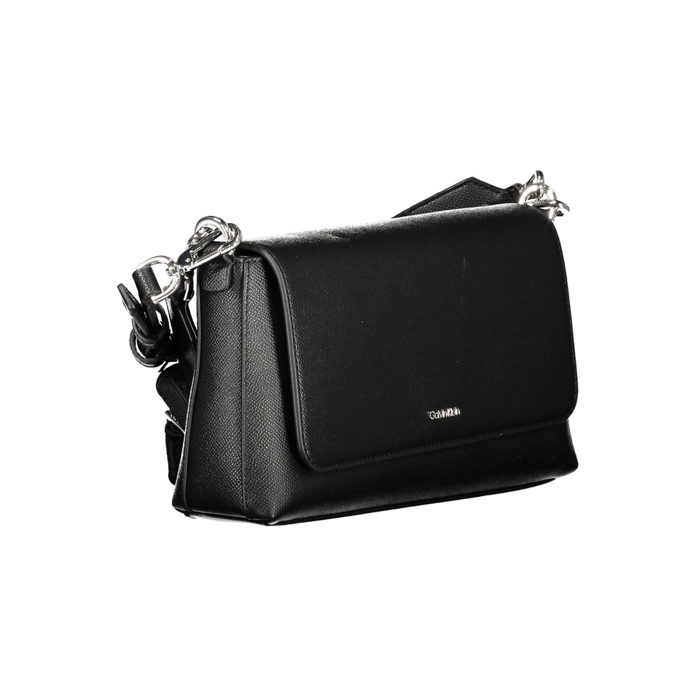 Crossbody Evening Handbag by Calvin Klein for women in polyethylene faux leather black presents a ornamental silhouette, showcasing a secure , ample internal-pockets & cardholder, and versatile crossbody-strap, shoulder-strap, adjustable-strap & handle for a ornamental finish.