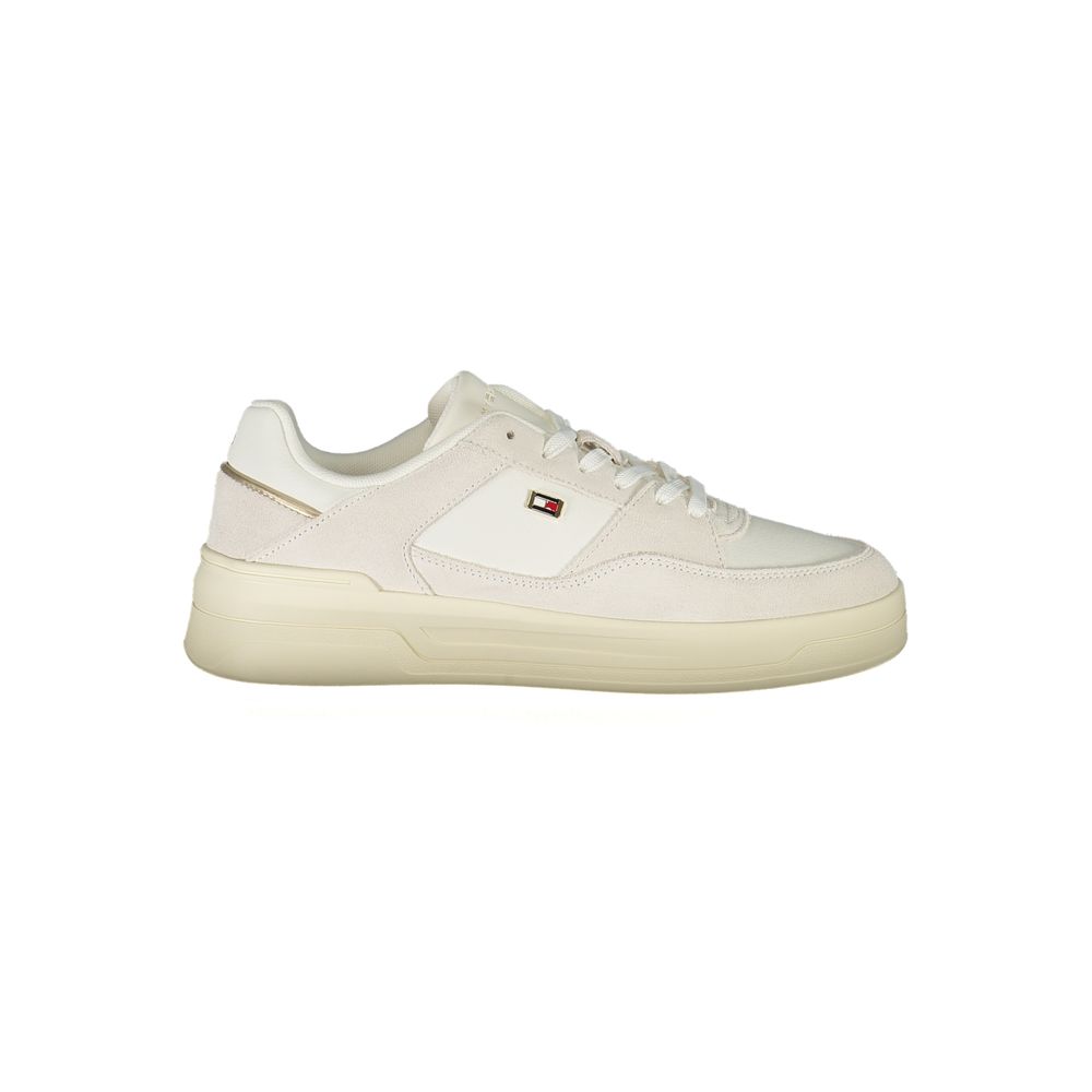 Athletic Sneakers by Tommy Hilfiger for women in polyester polyurethane leather white features an stately silhouette, showcasing the signature athletic style of the Women's Athletic Polyester Polyurethane Leather Sneakers collection with a truly stately finish.