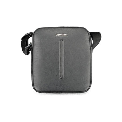 Shoulder Bag by Calvin Klein for men in polyester & polyethylene black features an effortlessly chic silhouette with a secure zipper, ample internal-pockets, and versatile shoulder-strap & adjustable-strap for effortlessly chic everyday luxury.