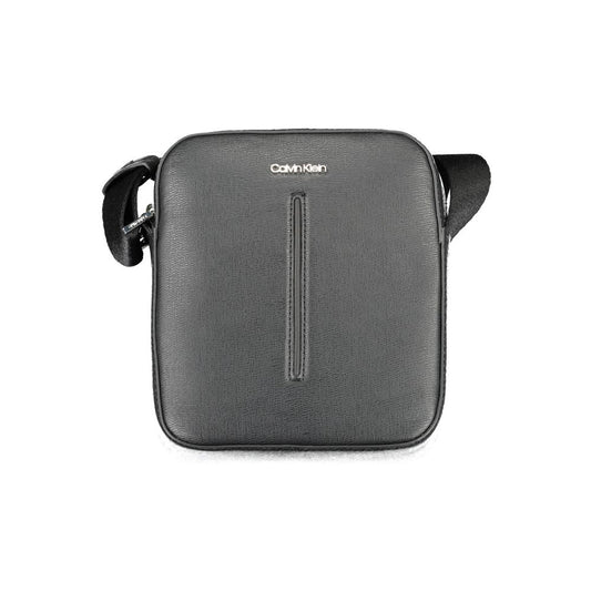 Shoulder Bag by Calvin Klein for men in polyester & polyethylene black features an effortlessly chic silhouette with a secure zipper, ample internal-pockets, and versatile shoulder-strap & adjustable-strap for effortlessly chic everyday luxury.