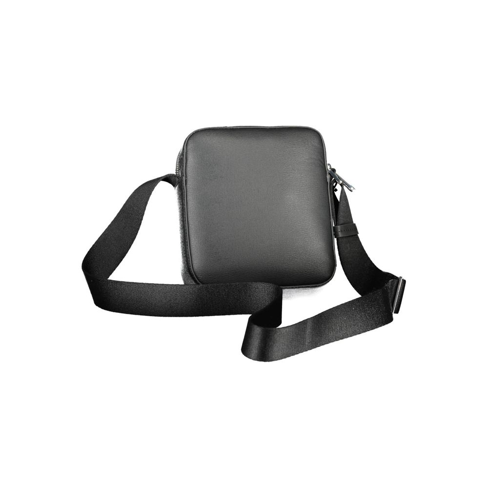 Shoulder Bag by Calvin Klein for men in polyester & polyethylene black showcases a statuesque silhouette, artfully detailed with a secure zipper, organized internal-pockets, and versatile shoulder-strap & adjustable-strap for a statuesque look.