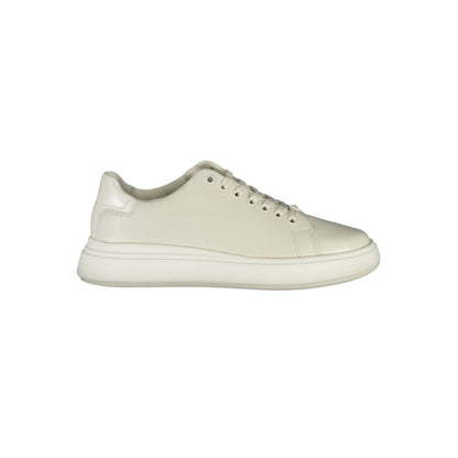 Sneakers by Calvin Klein for women in polyester leather beige features an sumptuous design from the Women's Fashion Polyester Leather Sneakers collection, highlighting a sumptuous fashion style for a premium, high-fashion look.