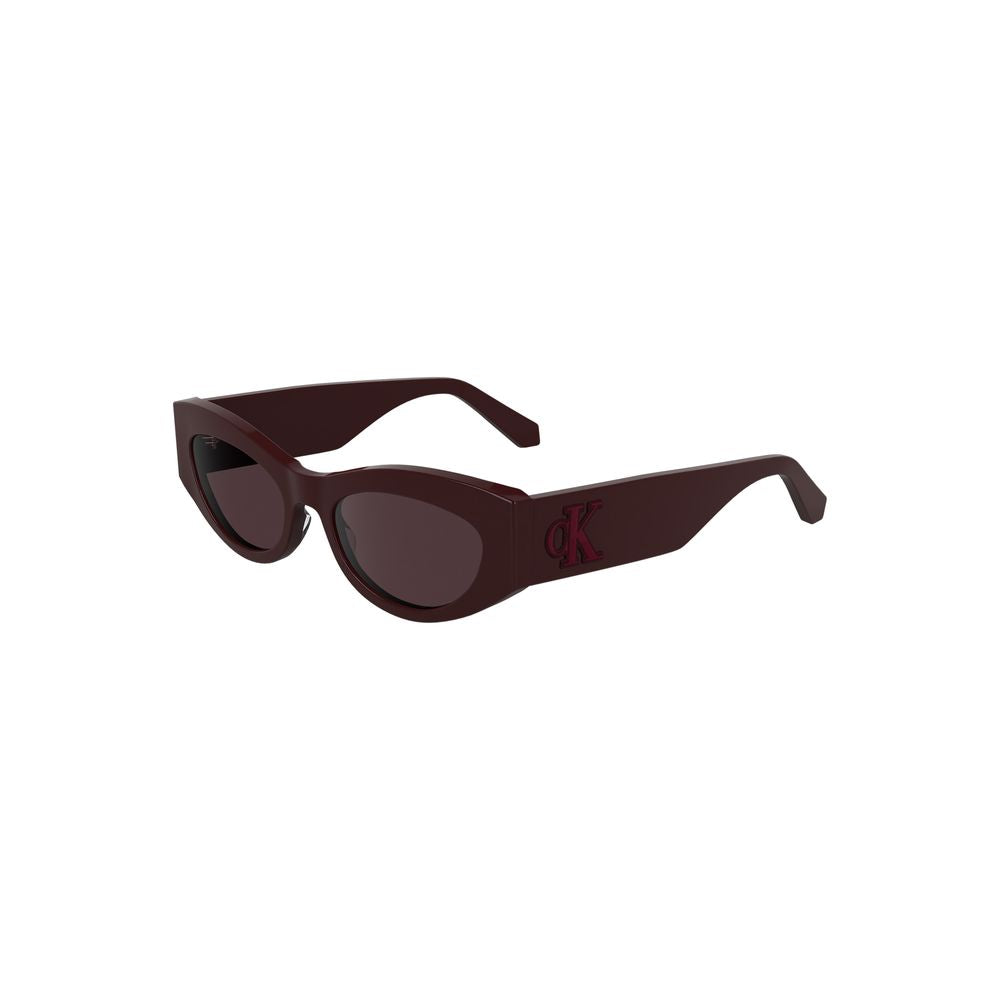 Sunglasses by Calvin Klein for women in brown & red features an ethereal cat-eye frame design with red coloured frame frames and for a ethereal finish.
