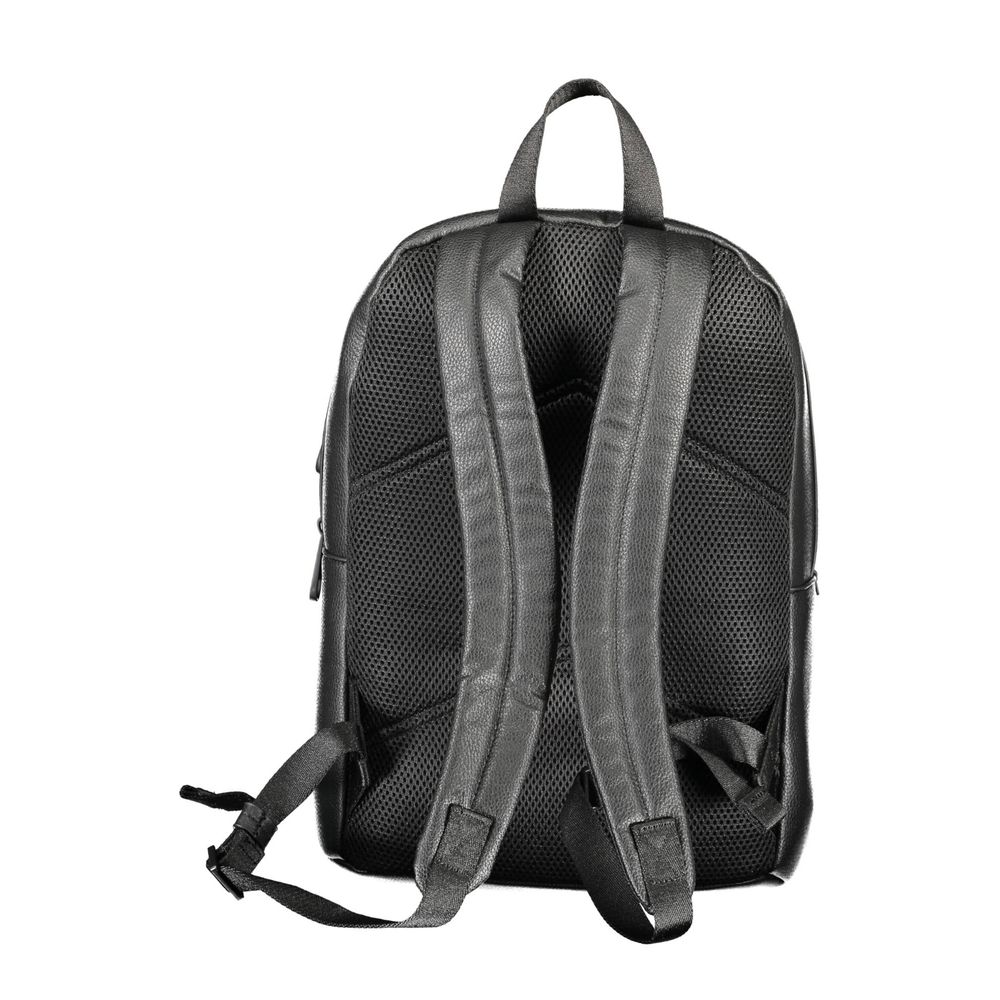 Backpack by Calvin Klein for men in polyester & polyethylene black features a refined silhouette, showcasing the Explorer Polyester & Polyethylene Backpack design with a secure zipper, ample external-pockets, internal-pockets & laptop-compartment, and versatile backpack-strap, adjustable-strap & handle.