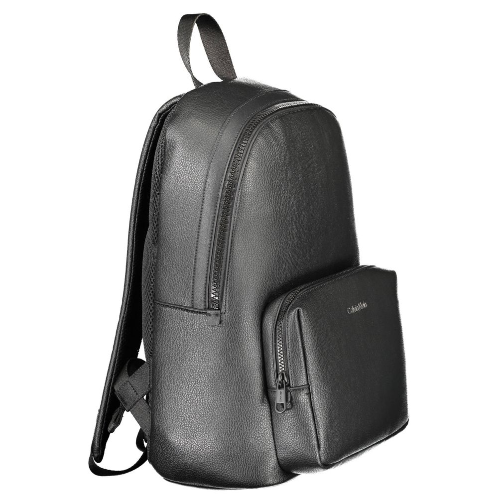 Backpack by Calvin Klein for men in polyester & polyethylene black presents a stately Explorer Polyester & Polyethylene Backpack design, showcasing a secure zipper with ample external-pockets, internal-pockets & laptop-compartment and versatile backpack-strap, adjustable-strap & handle for a stately finish.