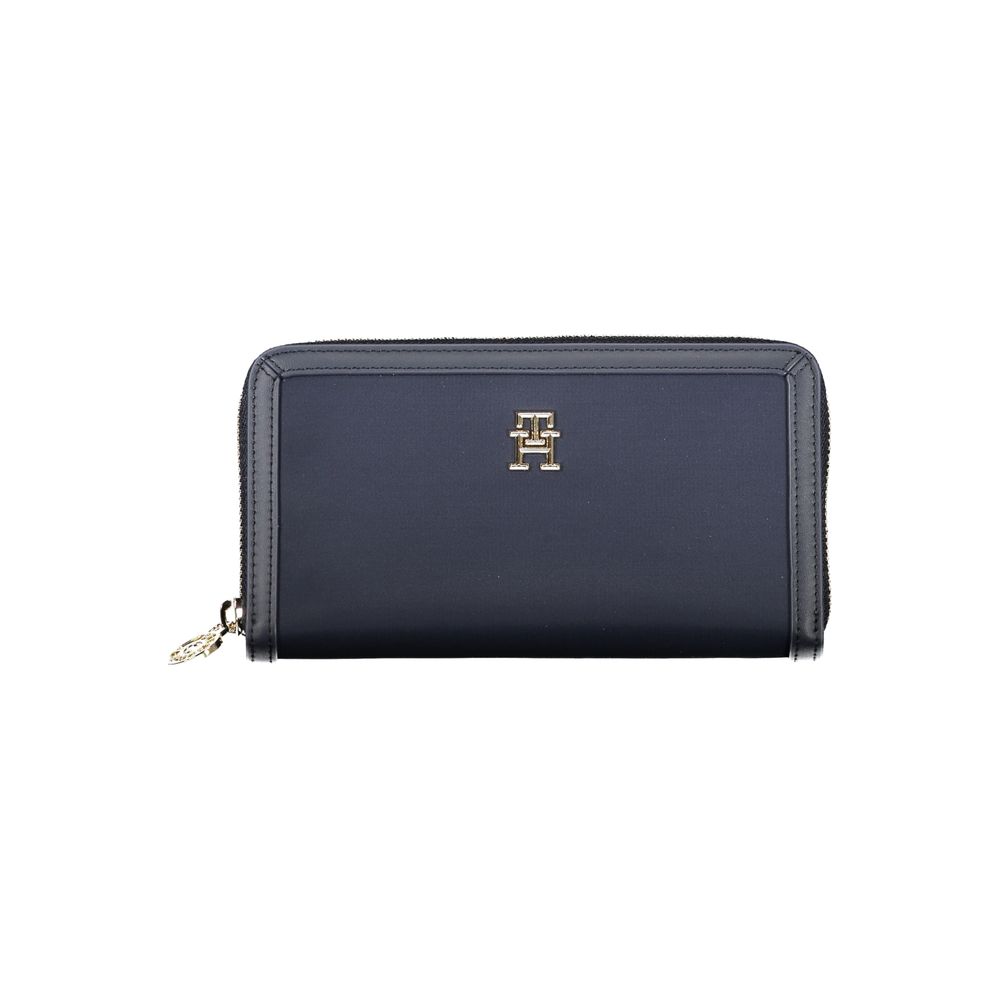 Cardholder Wallet by Tommy Hilfiger for women in polyester & polyurethane blue showcases a discerning silhouette, artfully capturing the essence of Polyester & Polyurethane Cardholder Wallet with its functional card-organization coin-purse.