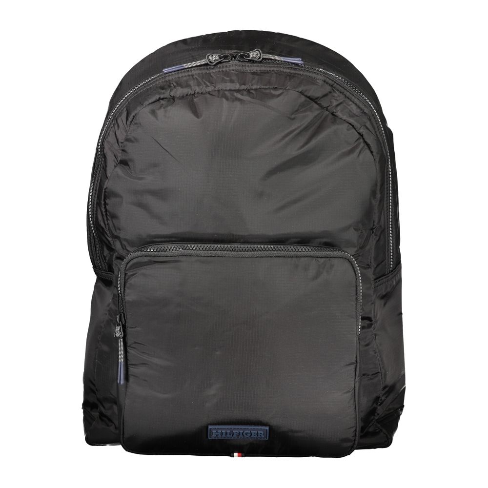 Backpack by Tommy Hilfiger for men in nylon black & signature presents a stately Nylon Backpack design, showcasing a secure zipper with ample external-pockets, internal-pockets & laptop-compartment and versatile handle, backpack-strap & adjustable-strap for a stately finish.