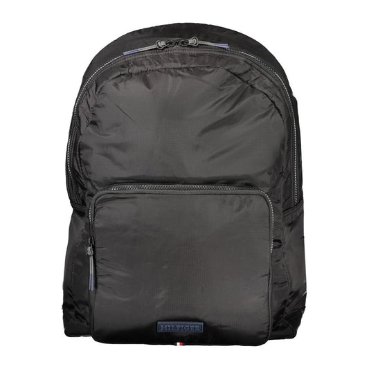 Backpack by Tommy Hilfiger for men in nylon black & signature presents a stately Nylon Backpack design, showcasing a secure zipper with ample external-pockets, internal-pockets & laptop-compartment and versatile handle, backpack-strap & adjustable-strap for a stately finish.