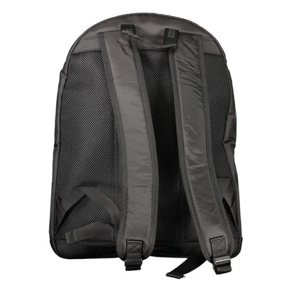 Backpack by Tommy Hilfiger for men in nylon black & signature features a stately Nylon Backpack design, showcasing a secure zipper, ample external-pockets, internal-pockets & laptop-compartment, and versatile handle, backpack-strap & adjustable-strap for a stately finish.