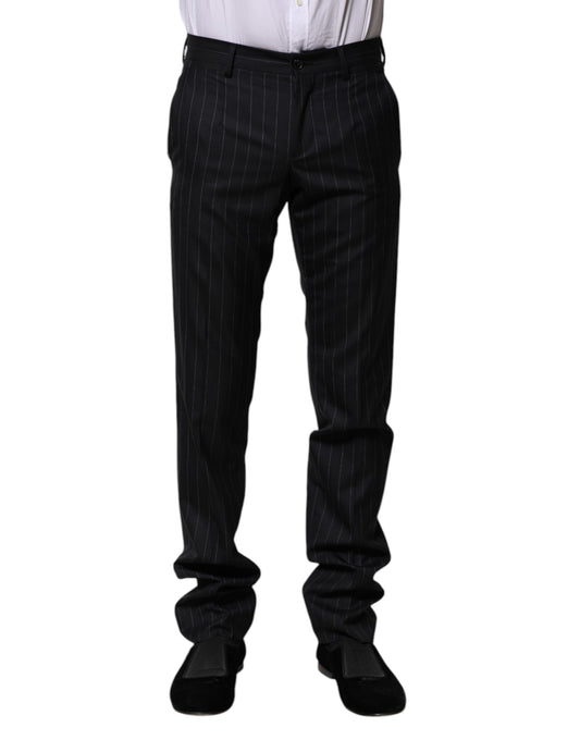 Pants by Dolce & Gabbana for men in virgin wool viscose & cupro black & striped features an understated silhouette, showcasing a sophisticated and long with a refined for an understated, polished aesthetic.