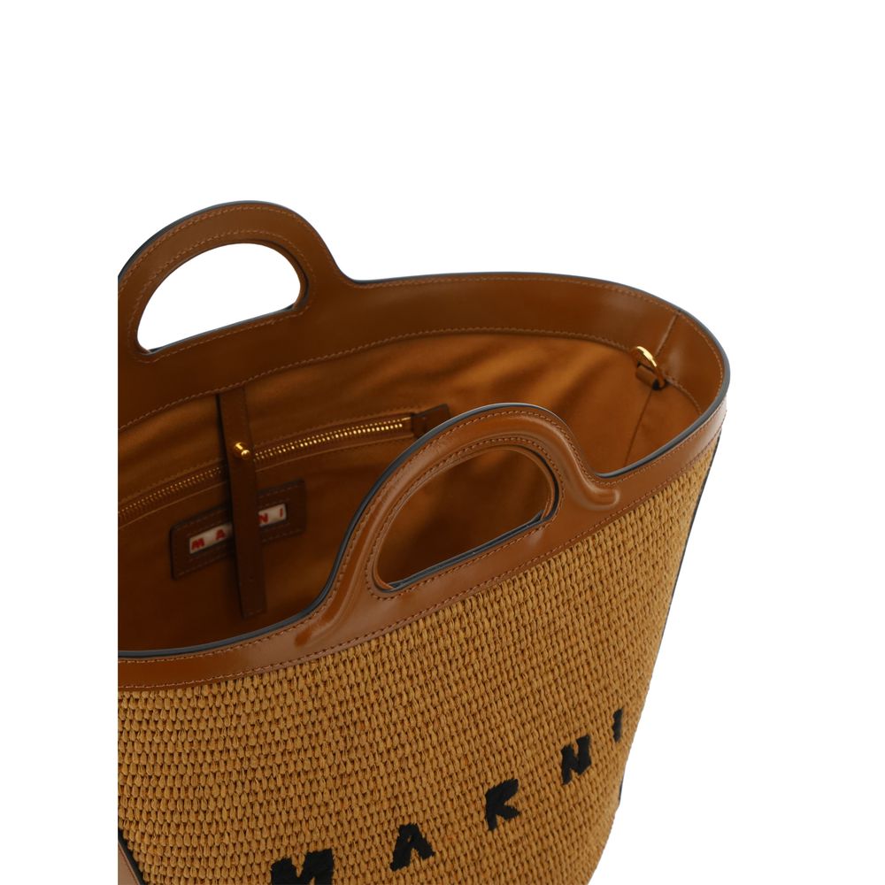 Shoulder Bucket Bag by Marni for women in raffia & bos taurus suede calfskin leather brown & monogram features a enviable silhouette, showcasing a secure zipper & drawstring, ample , and enviable shoulder-strap, handle & adjustable-strap for a enviable finish.