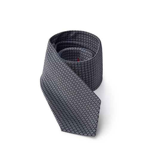 This Necktie by Jil Sander for men in silk gray, navy & print presents a effortless chic silhouette from the Silk Necktie collection, offering a effortless chic finish for a truly effortless chic look.