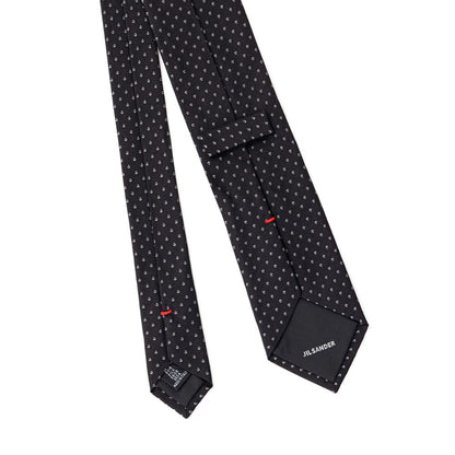 This Necktie by Jil Sander for men in silk blue & striped presents a effortless chic silhouette from the Silk Necktie collection, offering a effortless chic finish for a truly effortless chic look.