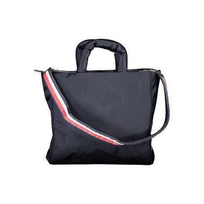 Handbag by Tommy Hilfiger for women in polyester & polyethylene blue features a signature silhouette, showcasing a secure zipper and signature with versatile shoulder-strap, adjustable-strap & handle for a sophisticated look.