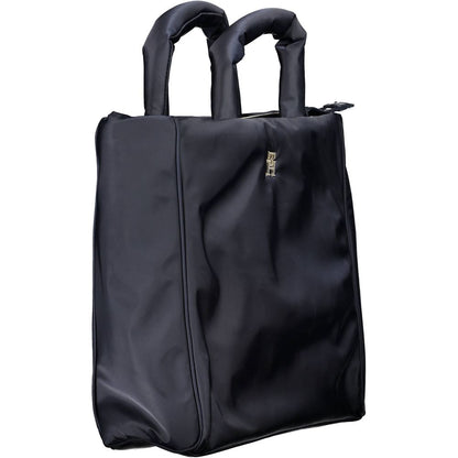 Handbag by Tommy Hilfiger for women in polyester & polyethylene blue features a refined silhouette, showcasing a secure zipper, organized , and versatile shoulder-strap, adjustable-strap & handle for a refined finish.