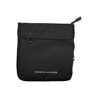 Shoulder Bag by Tommy Hilfiger for men in polyester black showcases a statuesque silhouette, artfully detailed with a secure zipper, organized external-pockets & internal-pockets, and versatile shoulder-strap & adjustable-strap for a statuesque look.
