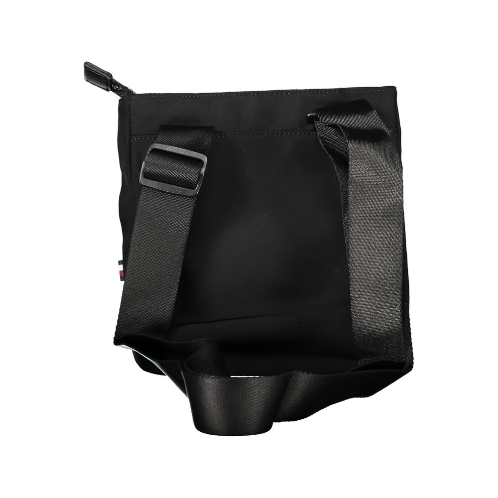 Shoulder Bag by Tommy Hilfiger for men in polyester black showcases a statuesque silhouette, artfully detailed with a secure zipper, organized external-pockets & internal-pockets, and versatile shoulder-strap & adjustable-strap for a statuesque look.