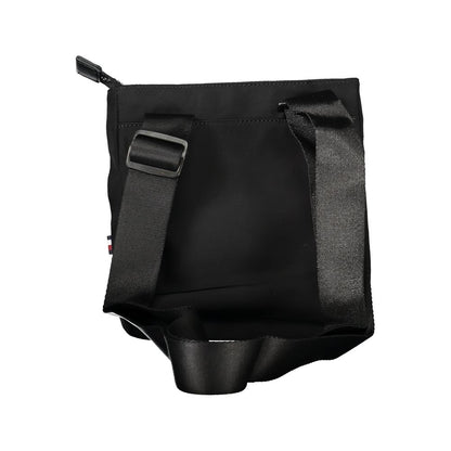 Shoulder Bag by Tommy Hilfiger for men in polyester black showcases a statuesque silhouette, artfully detailed with a secure zipper, organized external-pockets & internal-pockets, and versatile shoulder-strap & adjustable-strap for a statuesque look.