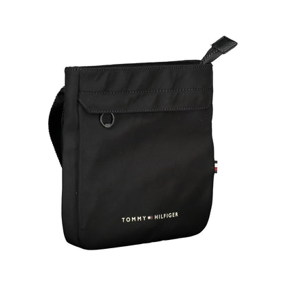 Shoulder Bag by Tommy Hilfiger for men in polyester black features a effortless chic silhouette with a secure zipper, ample external-pockets & internal-pockets, and versatile shoulder-strap & adjustable-strap for a effortless chic finish.