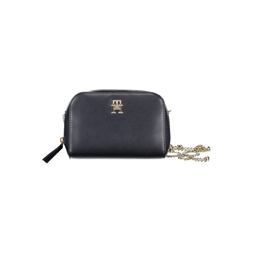 Shoulder Convertible Handbag by Tommy Hilfiger for women in polyethylene faux leather blue features a polished silhouette with a secure zipper, ample external-pockets & internal-pockets, and polished shoulder-strap for a sophisticated look.