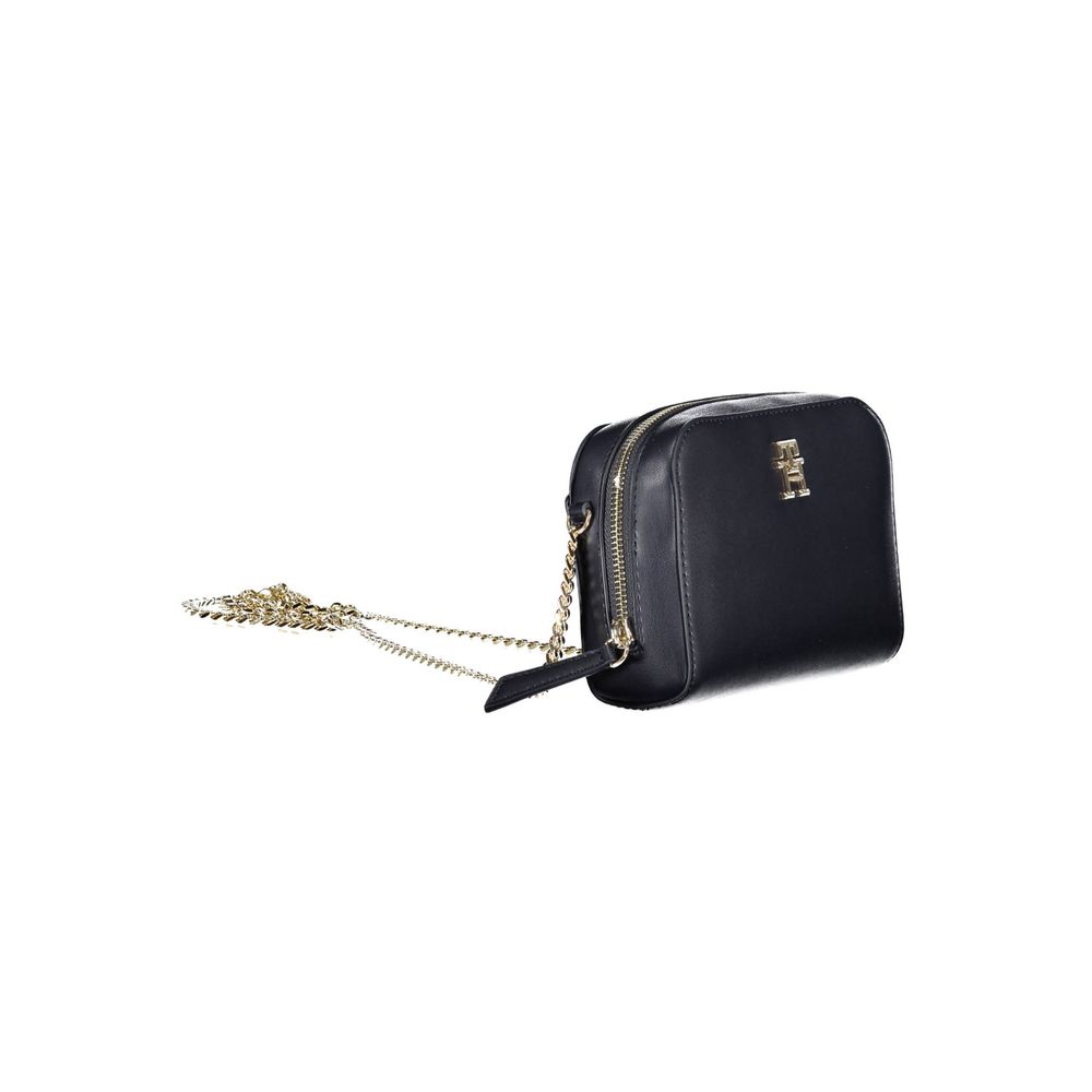 Shoulder Convertible Handbag by Tommy Hilfiger for women in polyethylene faux leather blue features a refined silhouette, showcasing a secure zipper and refined external-pockets & internal-pockets with versatile shoulder-strap for a refined finish.