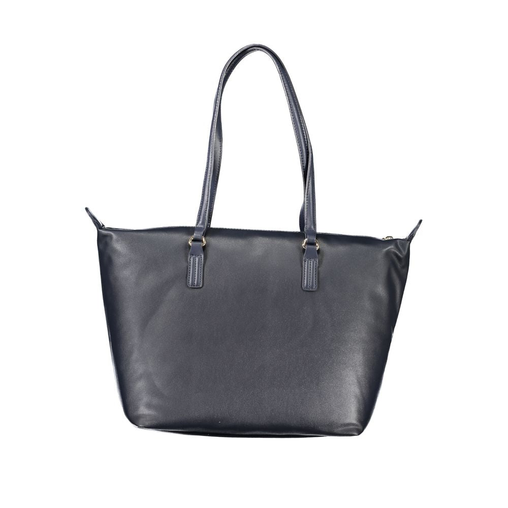Handbag by Tommy Hilfiger for women in polyester blue & signature features a refined silhouette, showcasing a secure zipper, organized internal-pockets, and versatile handle for a refined finish.