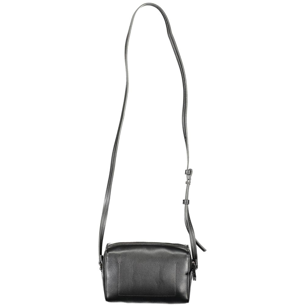 Crossbody Convertible Handbag by Calvin Klein for women in faux patent & pebbled leather black features a refined silhouette, showcasing a secure zipper and refined external-pockets & cardholder with versatile crossbody-strap & adjustable-strap for a refined finish.