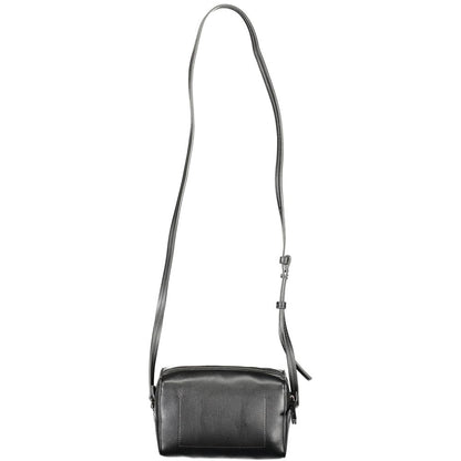 Crossbody Convertible Handbag by Calvin Klein for women in faux patent & pebbled leather black features a refined silhouette, showcasing a secure zipper and refined external-pockets & cardholder with versatile crossbody-strap & adjustable-strap for a refined finish.