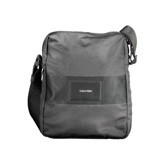 Evening Shoulder Bag by Calvin Klein for men in polyester & polyethylene black features a stately silhouette, showcasing a secure zipper, ample internal-pockets, and stately shoulder-strap & adjustable-strap for a stately finish.