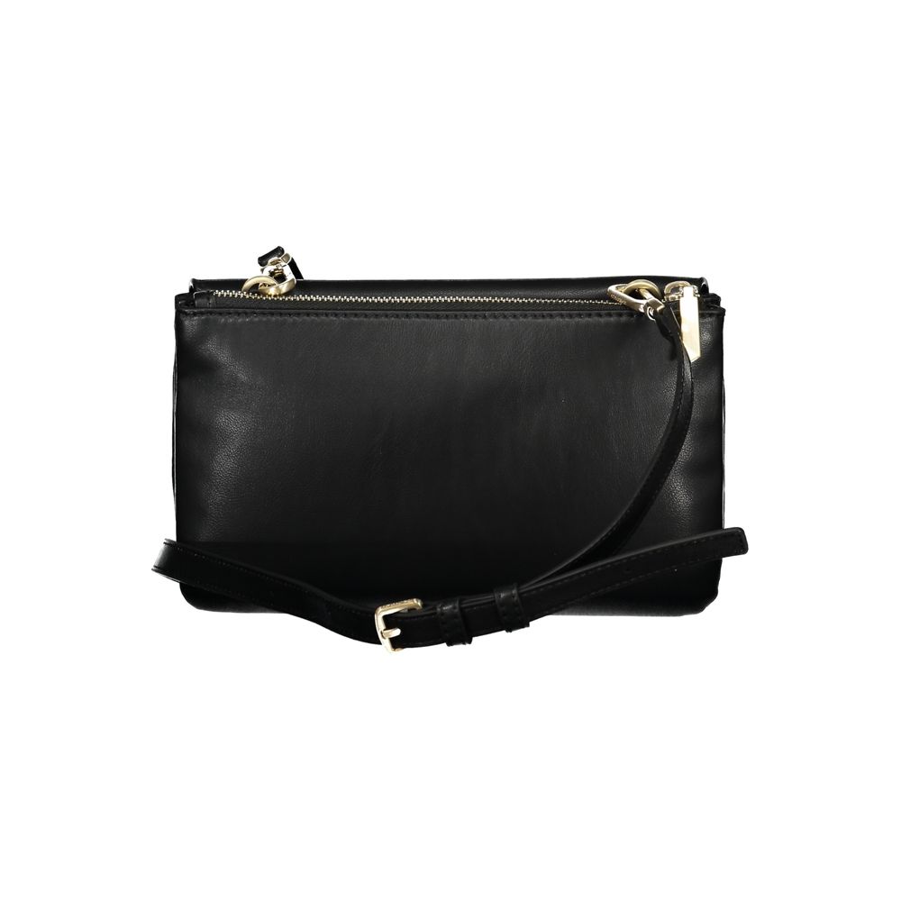 Shoulder Convertible Handbag by Calvin Klein for women in polyester faux leather black features a polished silhouette with a secure zipper, ample built-in-compartments & document-holder, and polished shoulder-strap & adjustable-strap for a sophisticated look.