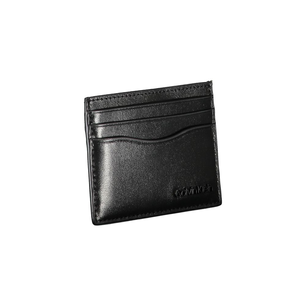 Cardholder Wallet by Calvin Klein for men in leather black presents a streamlined silhouette, showcasing the sophisticated design of the Leather Cardholder Wallet collection with functional card-organization.
